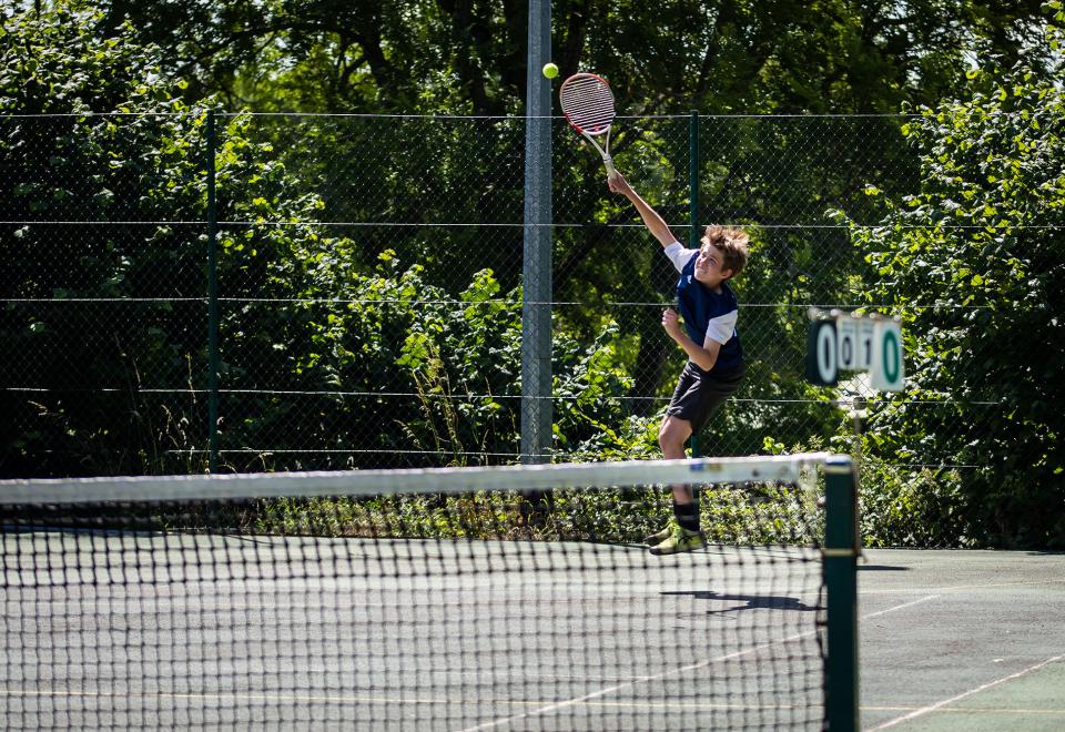 Bedales student playing tennis