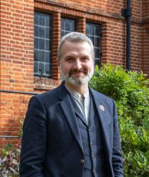 Will Goldsmith, Head of Bedales Schools, in front of library